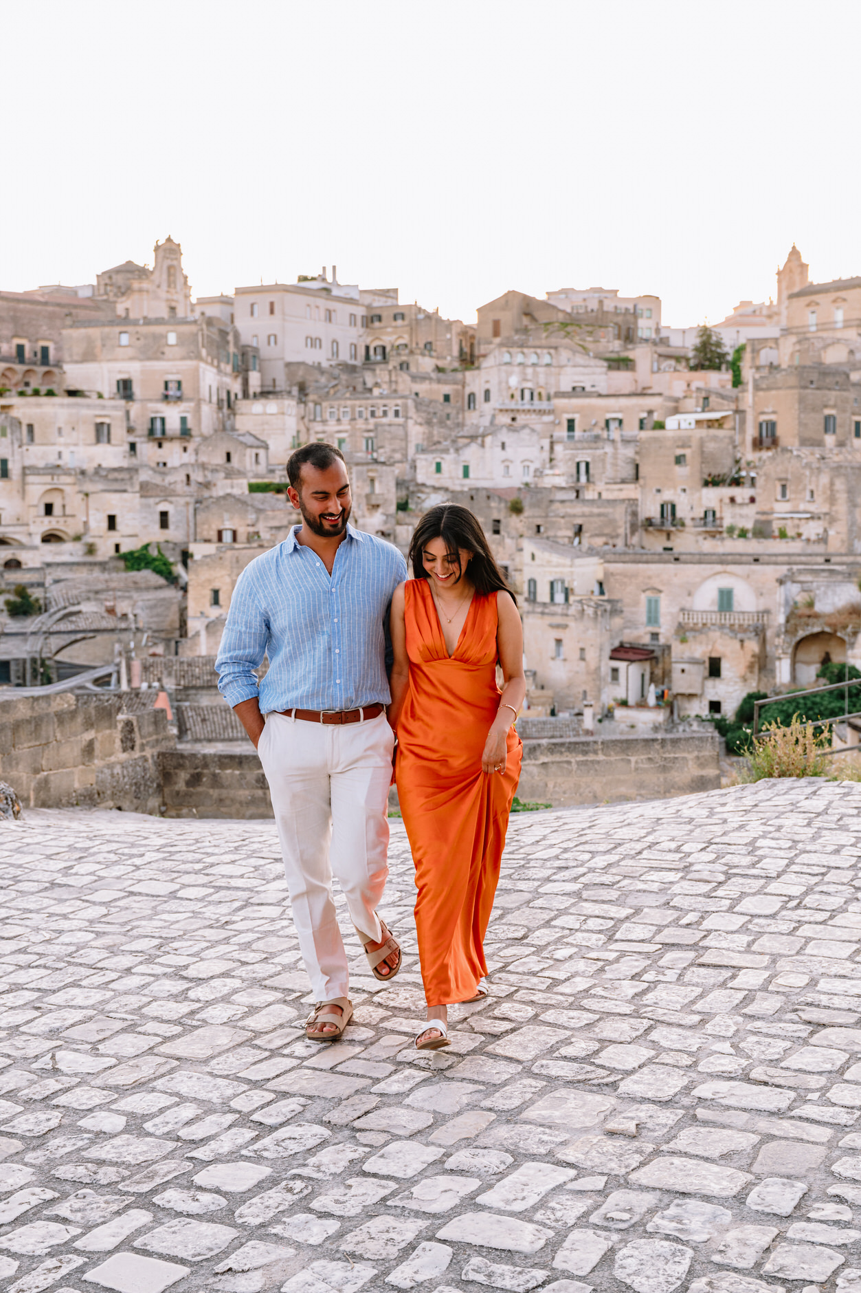 cuople walking in the most famous spot in matera